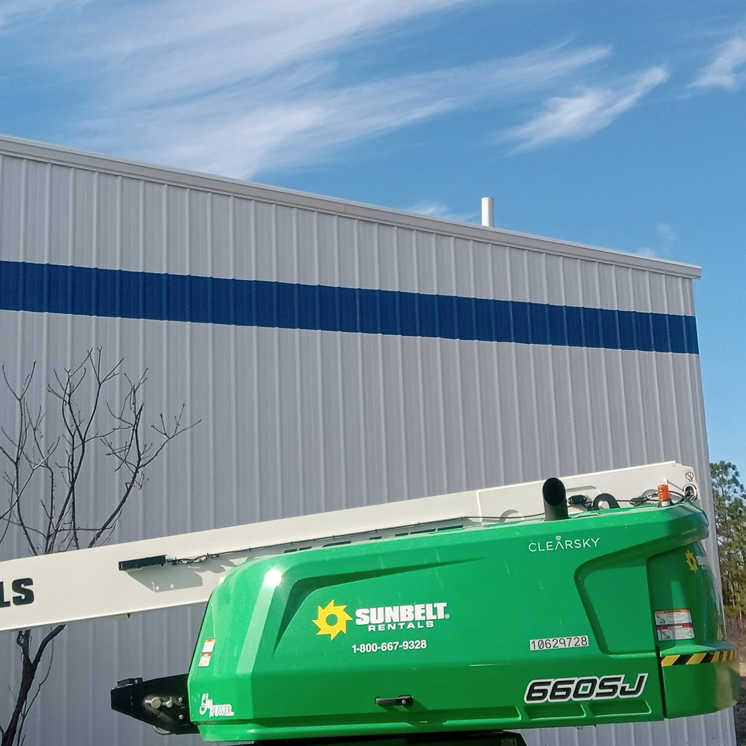 Commercial metal building exterior repainted by Cerro Painting in coastal North Carolina