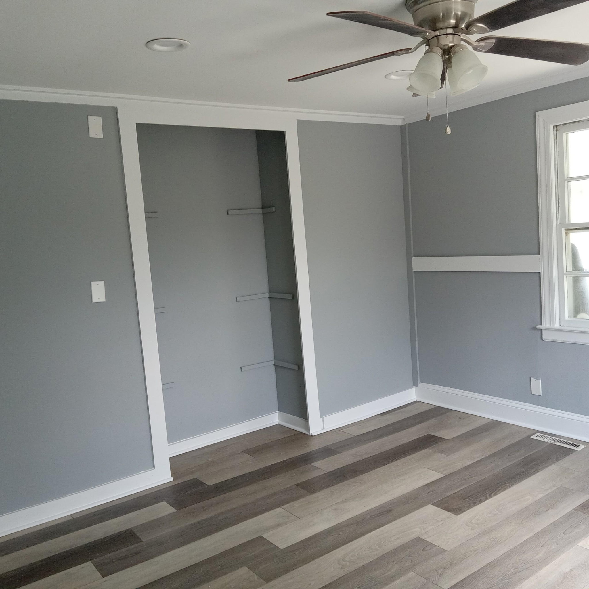 Freshly painted Wilmington interior with coastal gray walls and crisp white trim